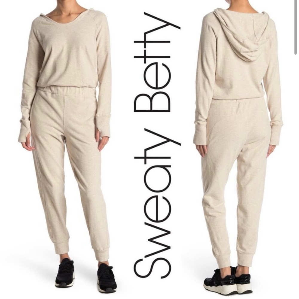 SWEATY BETTY | Jumpsuit Hibernate Luxe Hooded Jogger Oatmeal Marl
